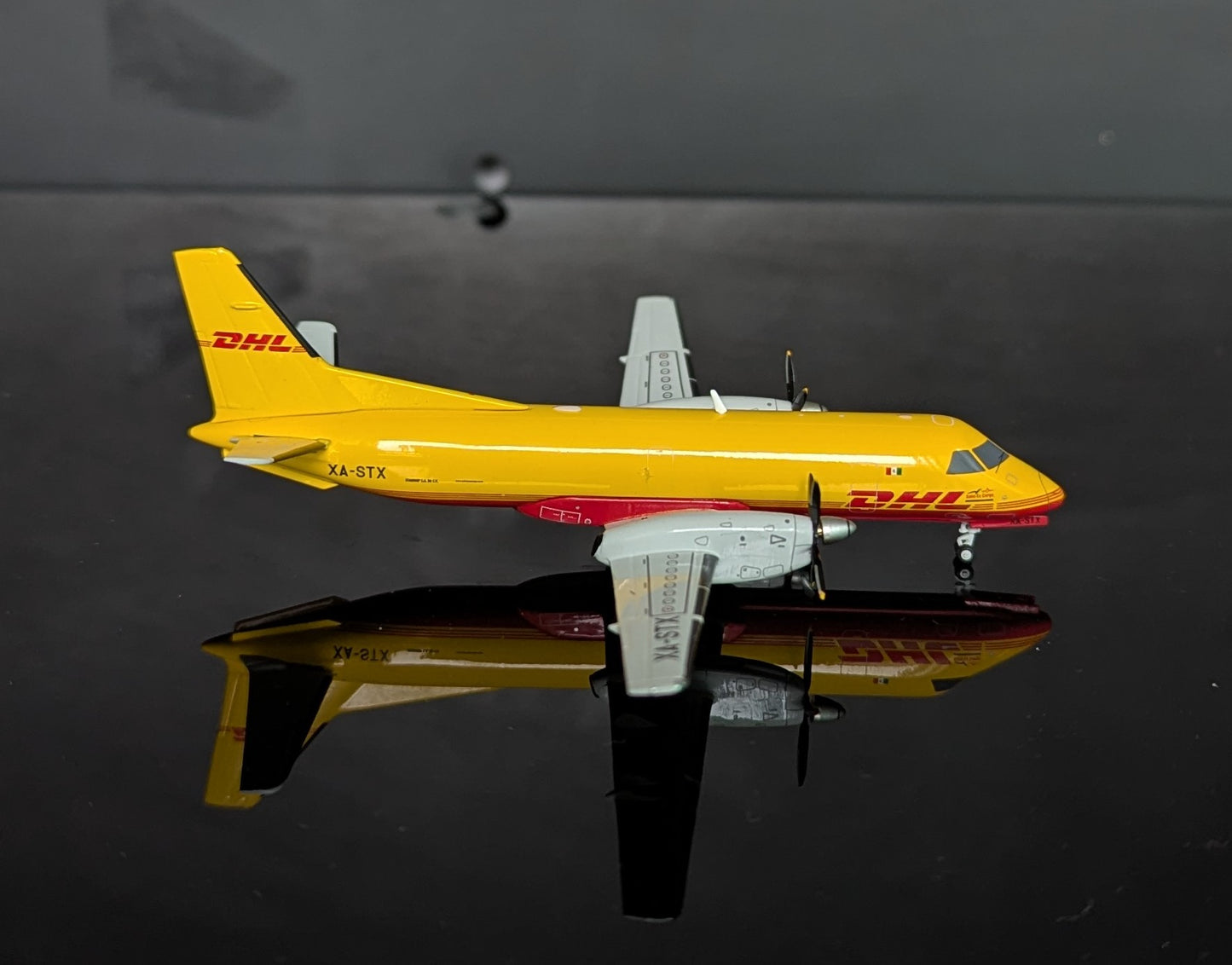 1:200 DHL Saab-340 JC Wings