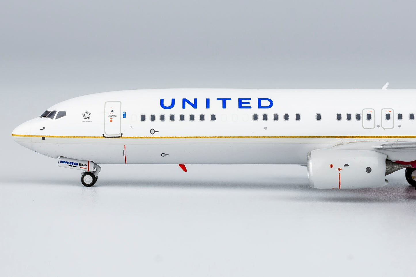 1:400 United Airlines B737-900ER "CO-UA merged livery; with scimitar winglets; March of Dimes" NG Models