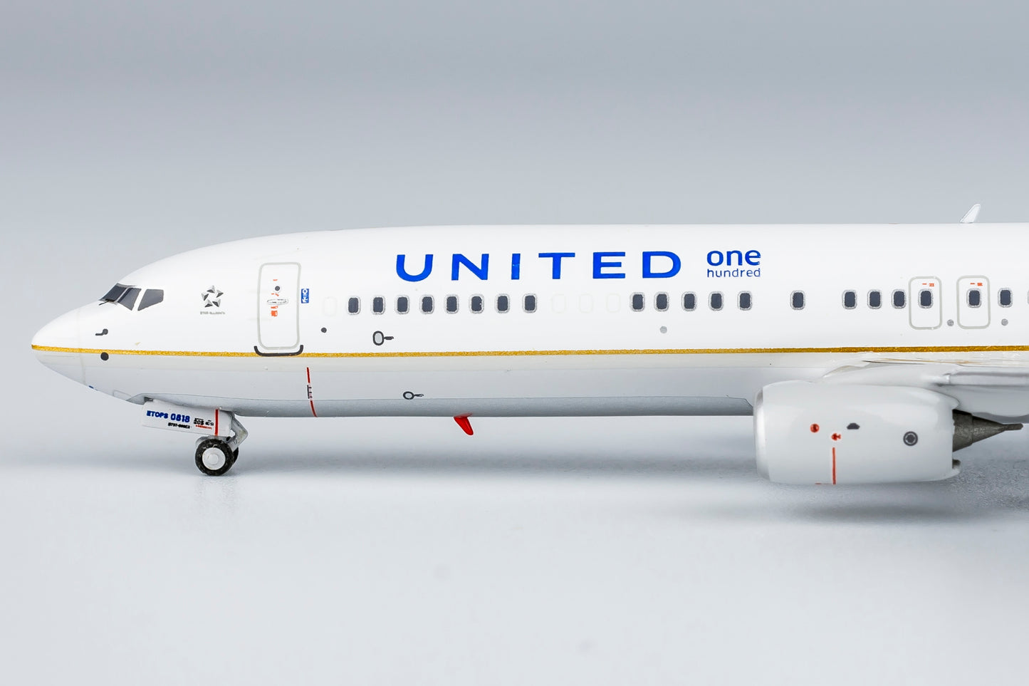 1:400 United Airlines B737-900ER "CO-UA merged livery; with scimitar winglets; with one hundred title" NG Models