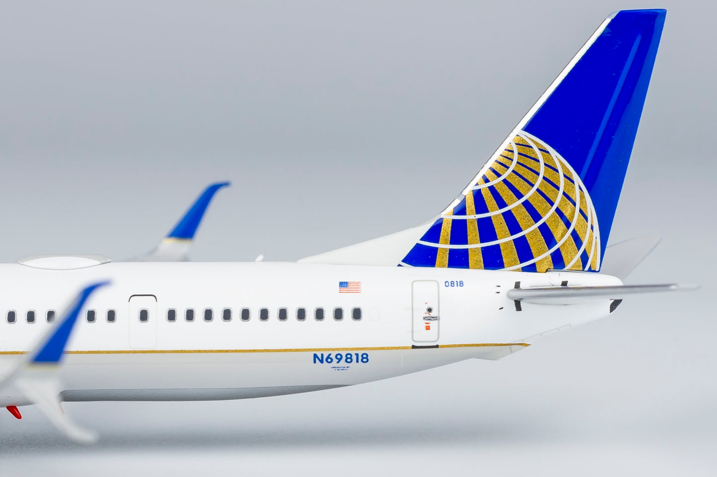 1:400 United Airlines B737-900ER "CO-UA merged livery; with scimitar winglets; with one hundred title" NG Models