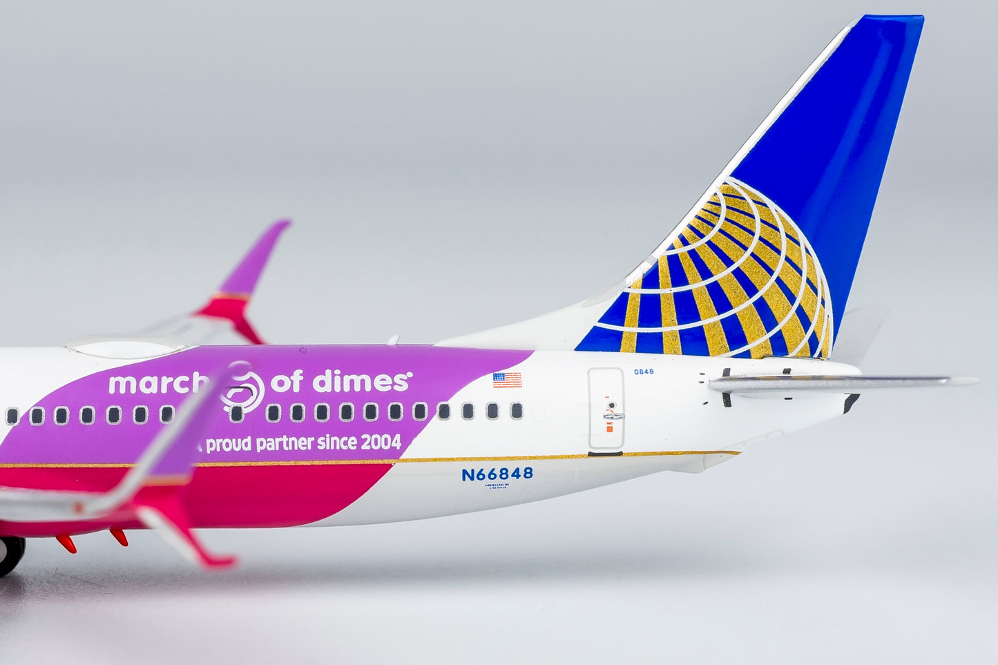 1:400 United Airlines B737-900ER "CO-UA merged livery; with scimitar winglets; March of Dimes" NG Models